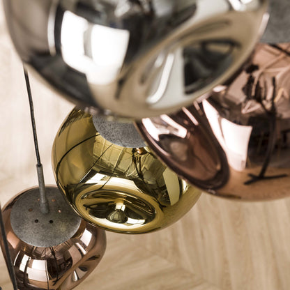 Elaris Pendelleuchte – 7‑teilige Metall‑Farbkombination in Gold, Kupfer und Chrom