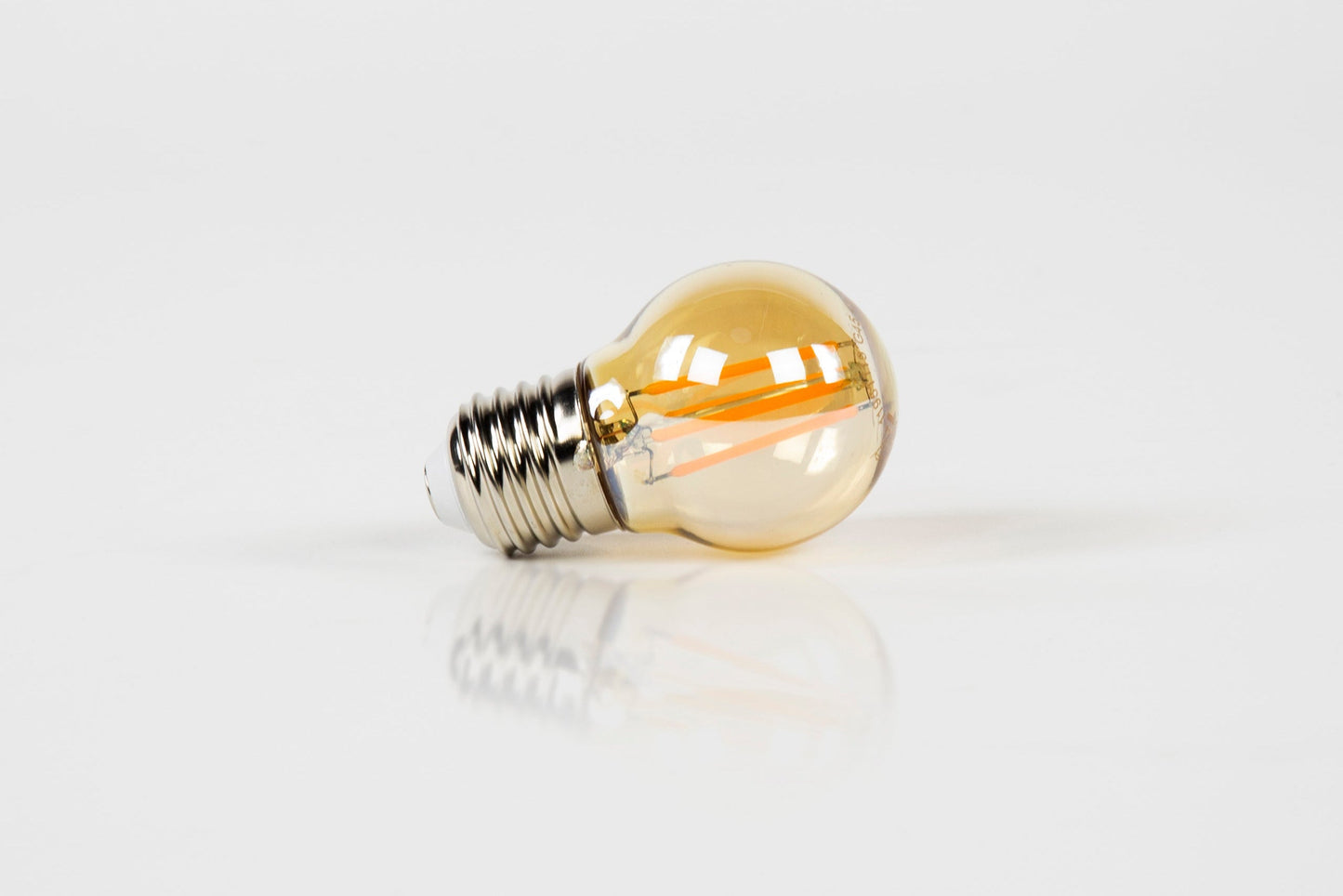 LED-Glühlampe Embera – G45-E27 mit amberfarbenem Glas