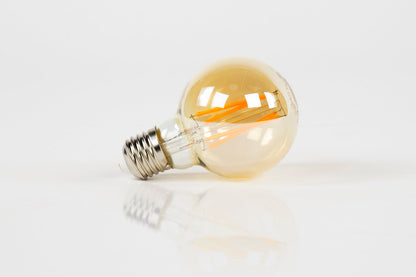 Calyra LED-Glühlampe G70‑E27 Filament Design mit amberfarbenem Glas