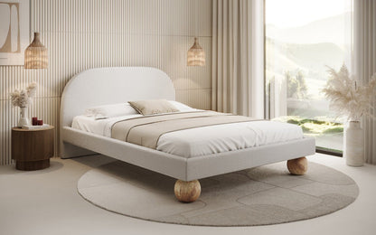 Luxusbetten24 Milo Designer Polsterbett Bouclé mit runden Holzfüßen