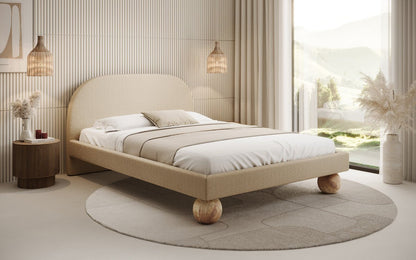 Luxusbetten24 Milo Designer Polsterbett Bouclé mit runden Holzfüßen