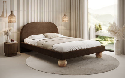 Luxusbetten24 Milo Designer Polsterbett Bouclé mit runden Holzfüßen