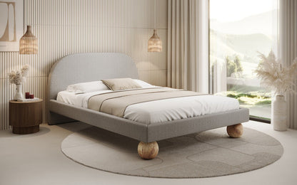 Luxusbetten24 Milo Designer Polsterbett Bouclé mit runden Holzfüßen