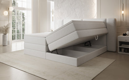 Luxusbetten24 Leni Boxspringbett mit hochklappbarem Stauraum in Teddy Bouclé