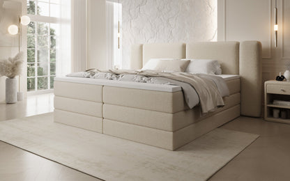 Luxusbetten24 Leni Boxspringbett mit hochklappbarem Stauraum in Teddy Bouclé