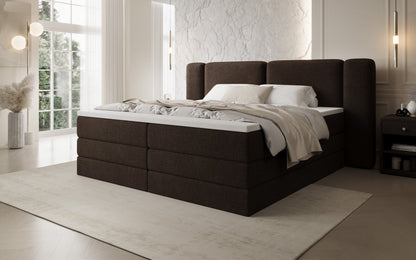 Luxusbetten24 Leni Boxspringbett mit hochklappbarem Stauraum in Teddy Bouclé