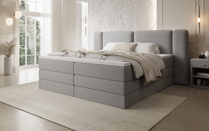 Luxusbetten24 Leni Boxspringbett mit hochklappbarem Stauraum in Teddy Bouclé