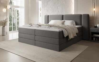 Luxusbetten24 Leni Boxspringbett mit hochklappbarem Stauraum in Teddy Bouclé
