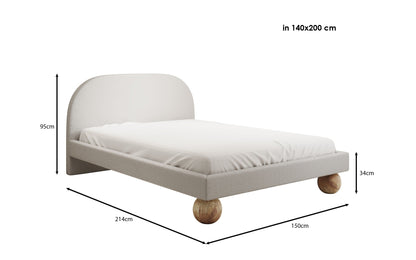 Luxusbetten24 Milo Designer Polsterbett Bouclé mit runden Holzfüßen