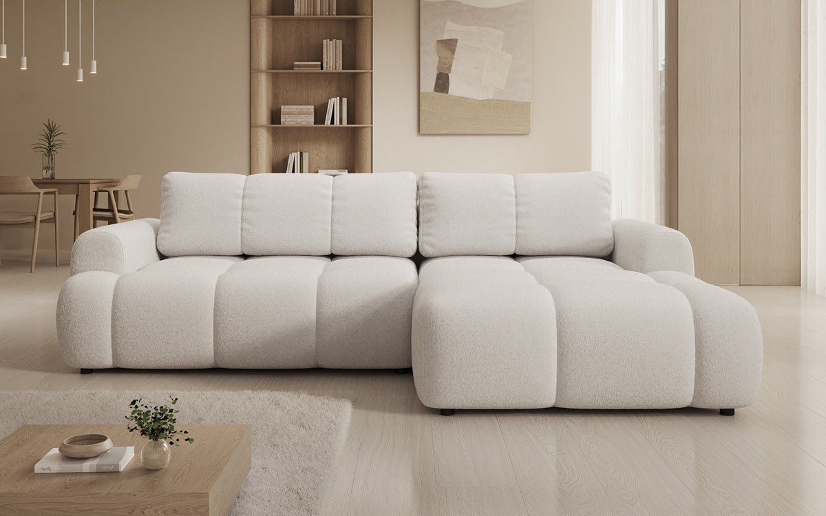 Luxusbetten24 Analfi L Sofa mit Schlaf‑Klappfunktion in Bouclé