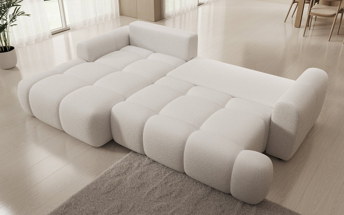 Luxusbetten24 Analfi L Sofa mit Schlaf‑Klappfunktion in Bouclé