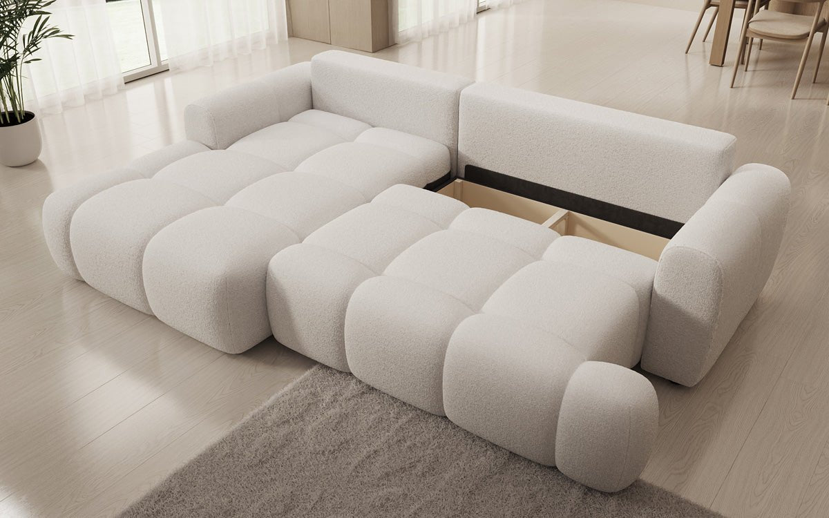 Luxusbetten24 Analfi L Sofa mit Schlaf‑Klappfunktion in Bouclé