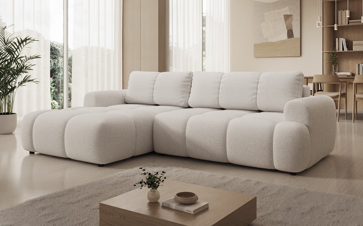 Luxusbetten24 Analfi L Sofa mit Schlaf‑Klappfunktion in Bouclé