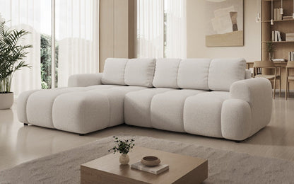 Luxusbetten24 Analfi L Sofa mit Schlaf‑Klappfunktion in Bouclé