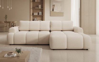 Luxusbetten24 Analfi L Sofa mit Schlaf‑Klappfunktion in Bouclé