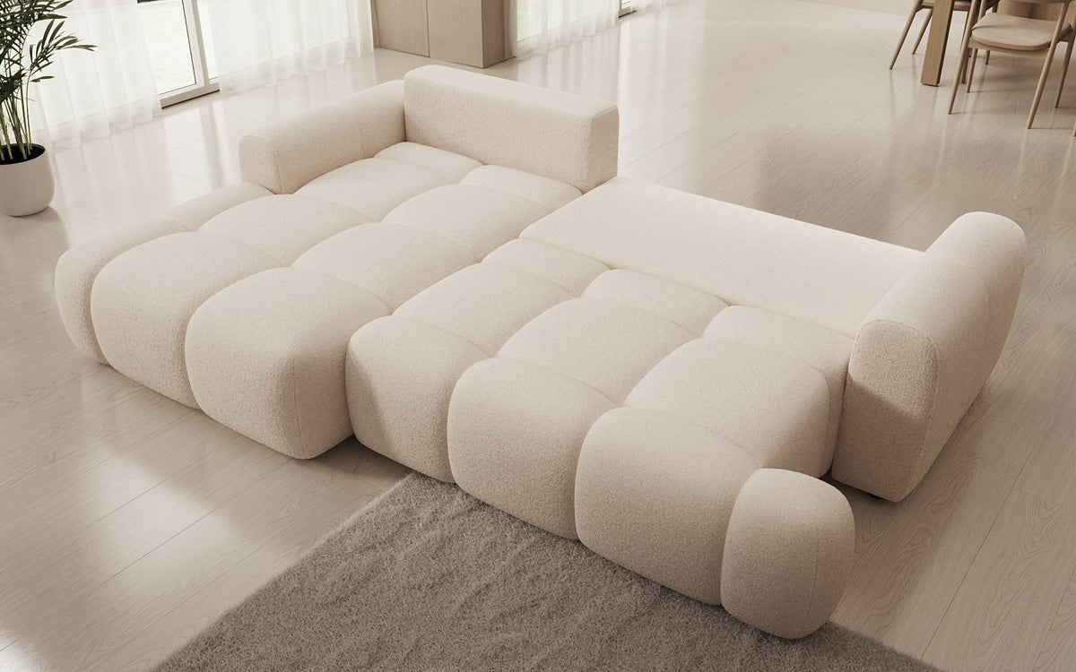 Luxusbetten24 Analfi L Sofa mit Schlaf‑Klappfunktion in Bouclé