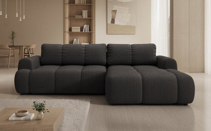 Luxusbetten24 Analfi L Sofa mit Schlaf‑Klappfunktion in Bouclé