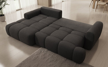 Luxusbetten24 Analfi L Sofa mit Schlaf‑Klappfunktion in Bouclé