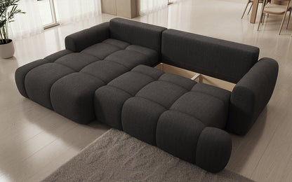 Luxusbetten24 Analfi L Sofa mit Schlaf‑Klappfunktion in Bouclé