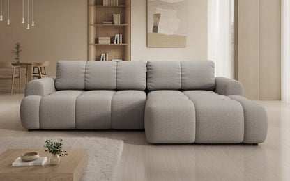 Luxusbetten24 Analfi L Sofa mit Schlaf‑Klappfunktion in Bouclé