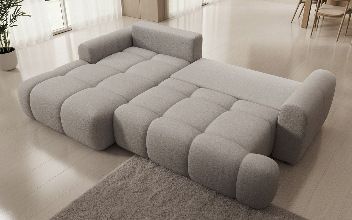 Luxusbetten24 Analfi L Sofa mit Schlaf‑Klappfunktion in Bouclé