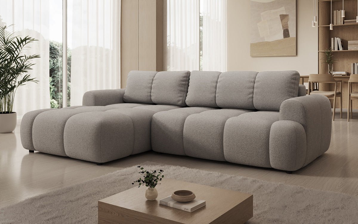 Luxusbetten24 Analfi L Sofa mit Schlaf‑Klappfunktion in Bouclé
