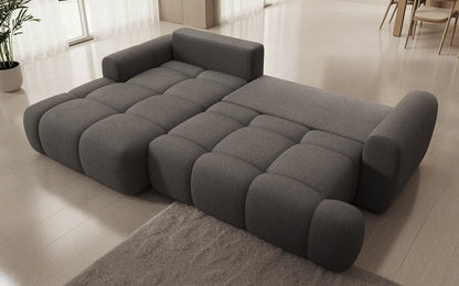 Luxusbetten24 Analfi L Sofa mit Schlaf‑Klappfunktion in Bouclé