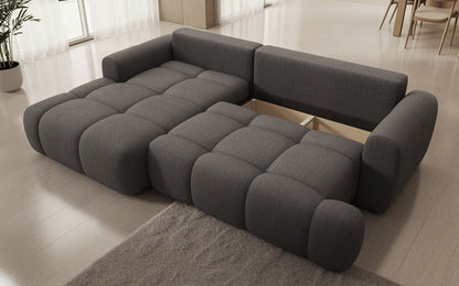 Luxusbetten24 Analfi L Sofa mit Schlaf‑Klappfunktion in Bouclé