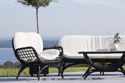 Luxusbetten24 Porto Loungesessel Schwarzer Rattan Gartenstuhl für Entspannte Stunden