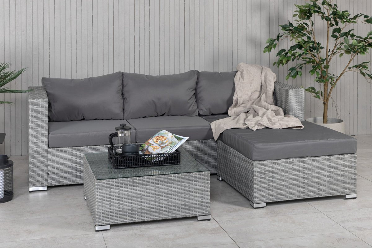 Luxusbetten24 Amelia Gartenloungeset Polyrattan Sofa mit Tisch, Kissen und Grau