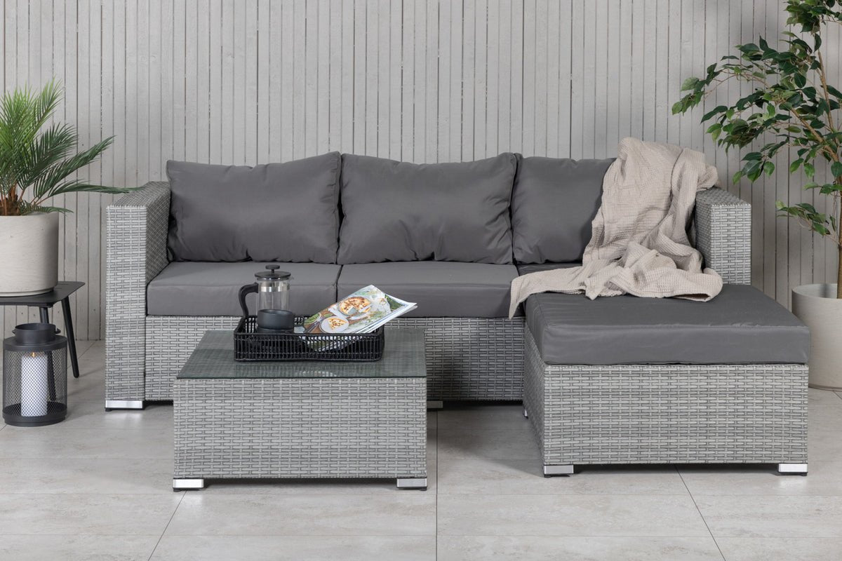 Luxusbetten24 Amelia Gartenloungeset Polyrattan Sofa mit Tisch, Kissen und Grau