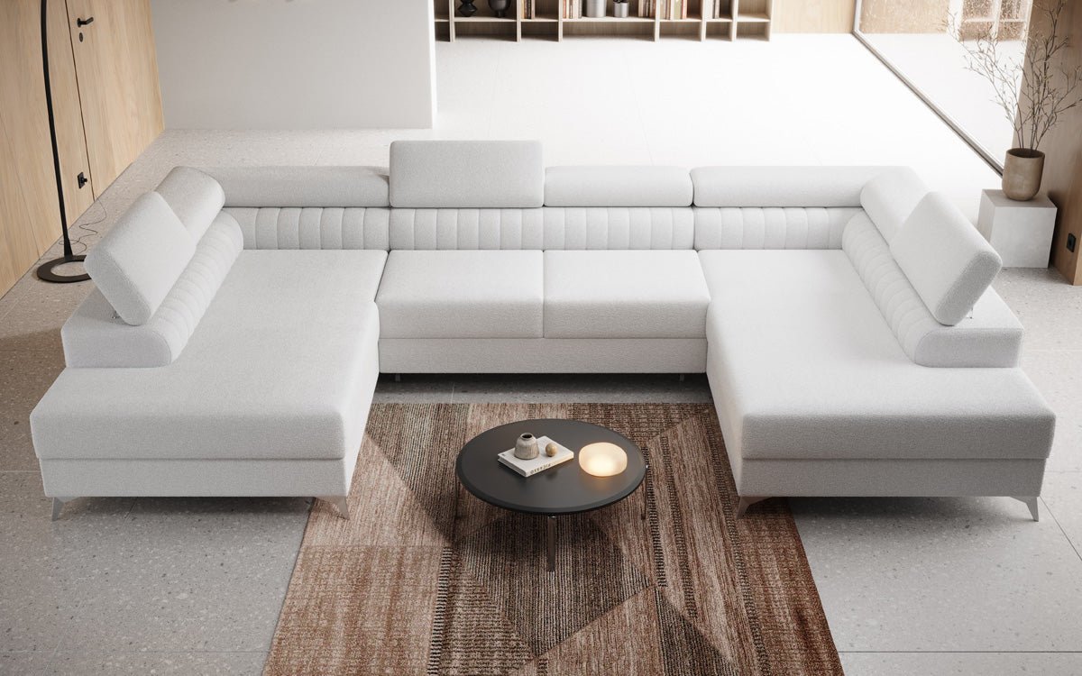 Luxusbetten24 Aurea U Sofa mit Schlaf‑ und Klappfunktion in Bouclé