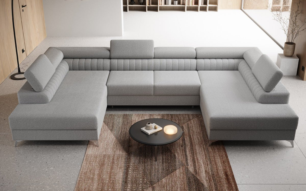 Luxusbetten24 Aurea U Sofa mit Schlaf‑ und Klappfunktion in Bouclé