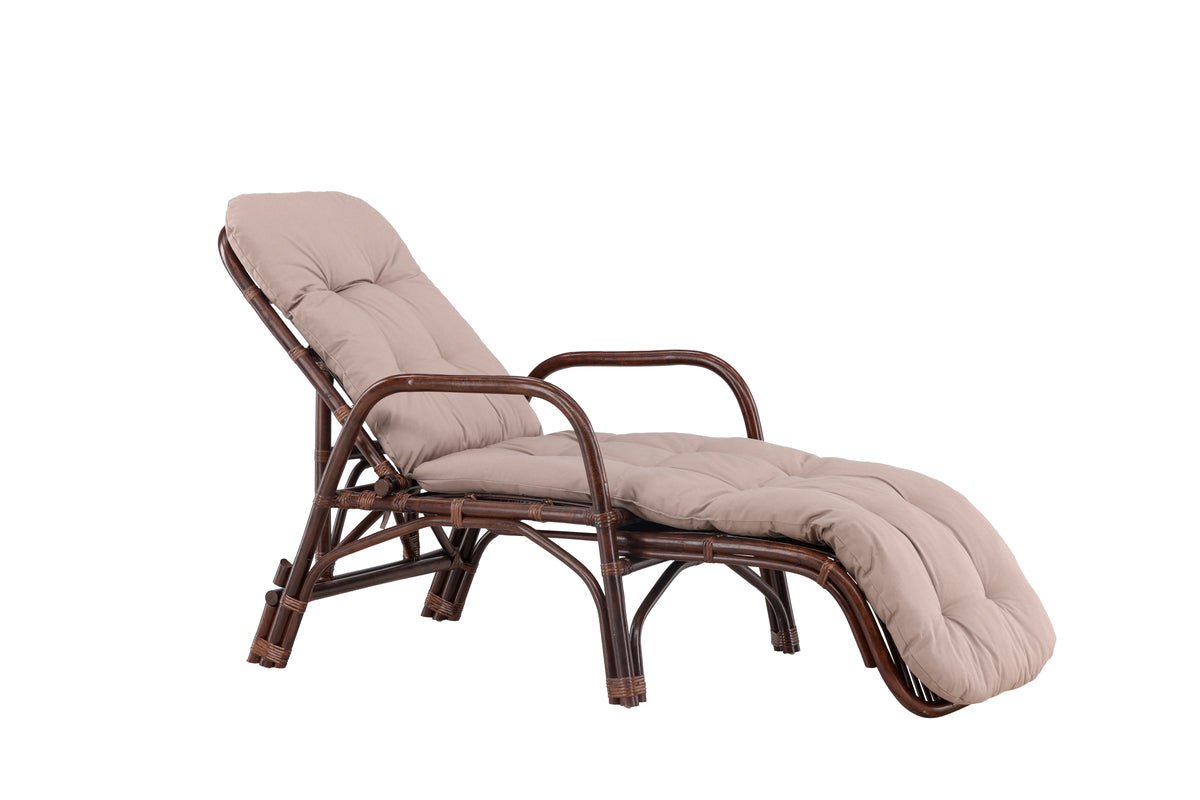 Luxusbetten24 Sonnenliege Virell aus Rattan mit Kissen, Walnuss
